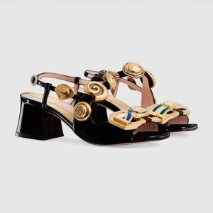 Gucci Mid-heel sandal with interlocking G buckles